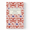 A hardcover book titled 'The Eternal Audience Of One' by Rémy Ngamijie, featuring a light pink cover with a repeating pattern of red birds and leaves and a central cream-colored label.