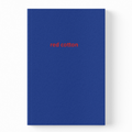 A blue hardcover notebook with the words 'red cotton' printed in small red lowercase letters on the front, shown against a plain white background.