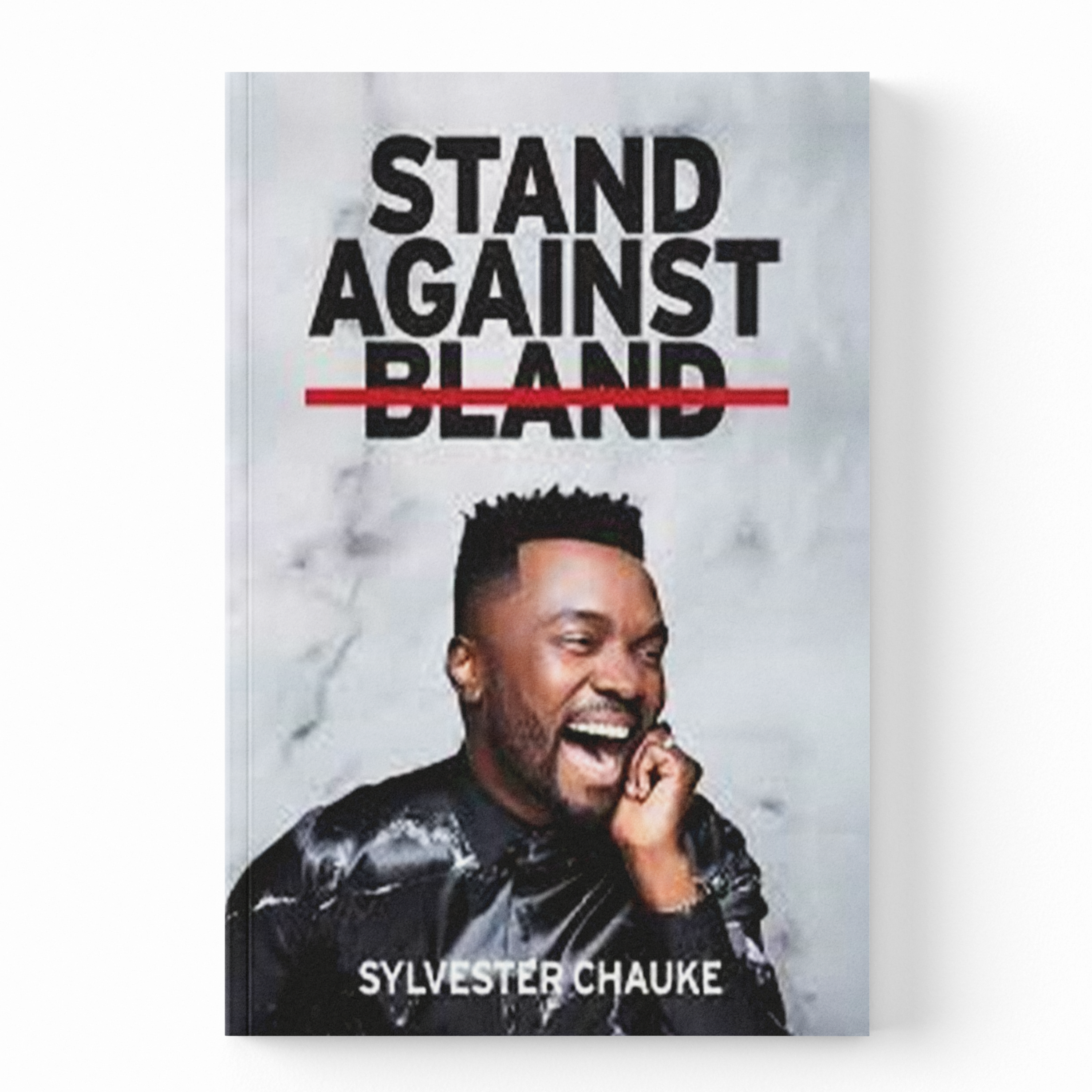 A book cover for 'Stand Against Bland' by Sylvestor Chauke, featuring a black and white portrait of a man on a light gray background with a red strike-through on the word 'BLAND'.